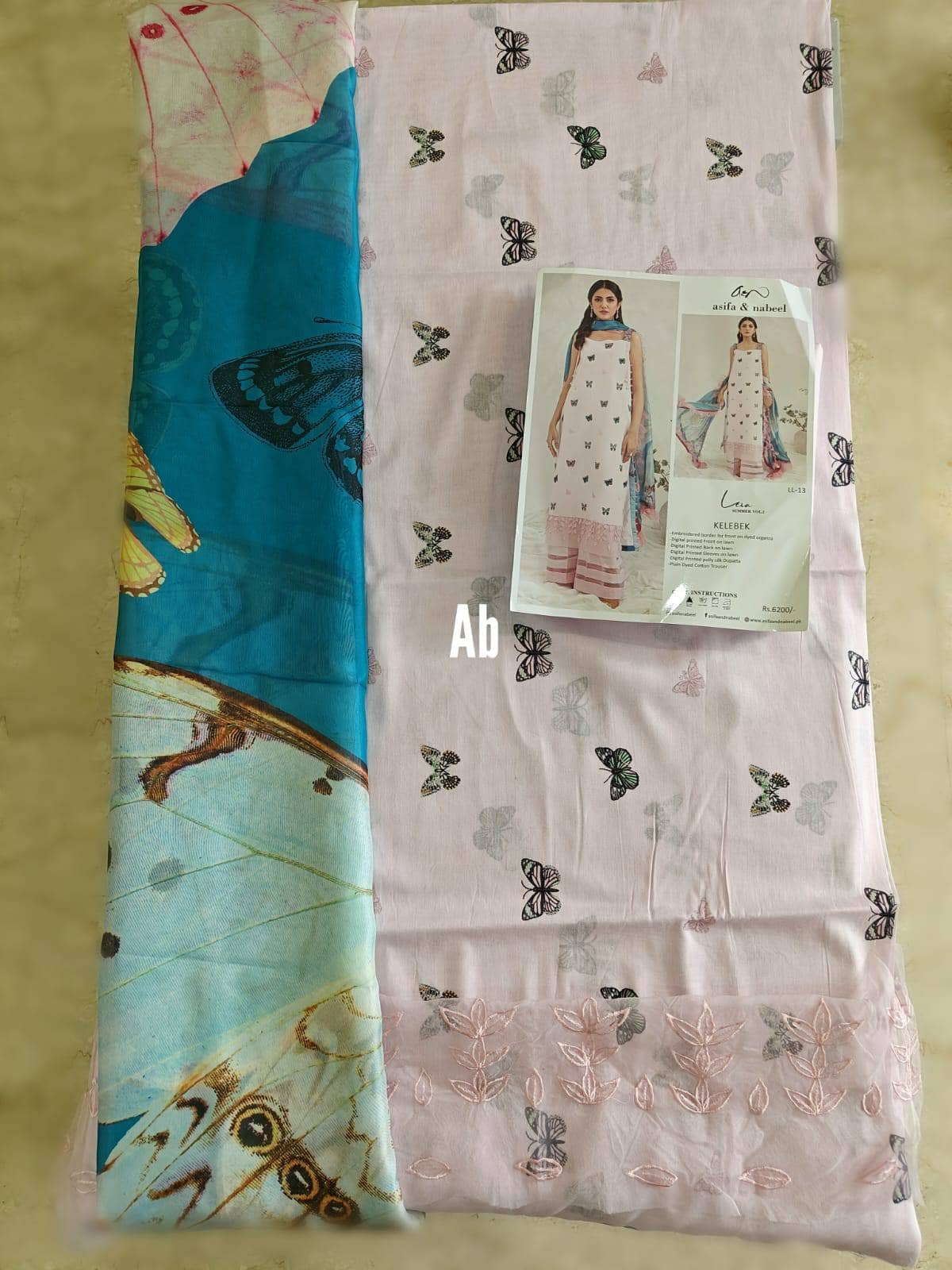 img_open_pic_asifa_and_nabeel_lawn_awwal_boutique