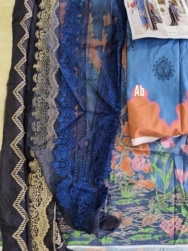 img_charizma_naranji_lawn_awwal_boutique