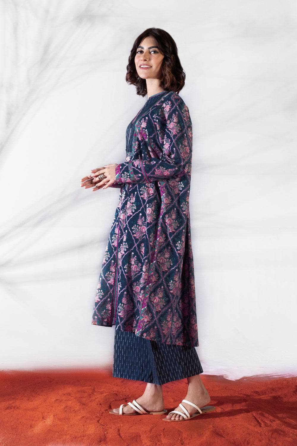 Don't be afraid to make a splash in this colourful geometric print! This unstitched three piece outfit features a lightly embroidered printed lawn shirt, voile dupatta and cotton trousers. Product Detail Unstitched 3-Piece Shirt Embroidered Neckline 1PC Embroidered Border 1PC Printed Lawn Shirt 3M Fabric: Lawn Color: Multi