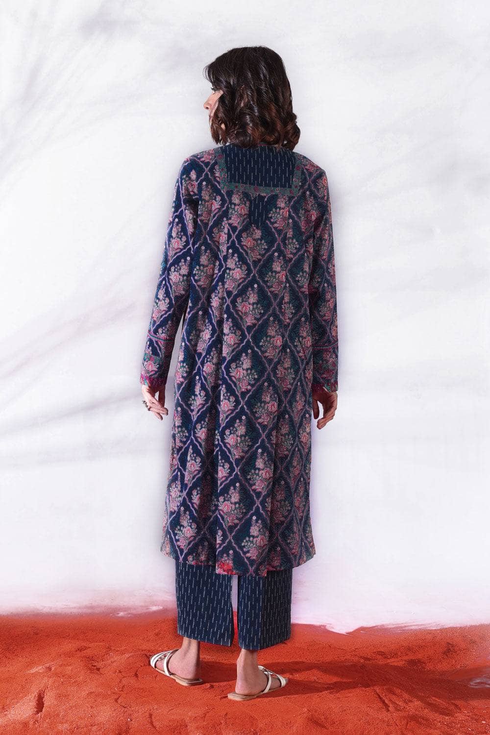 Don't be afraid to make a splash in this colourful geometric print! This unstitched three piece outfit features a lightly embroidered printed lawn shirt, voile dupatta and cotton trousers. Product Detail Unstitched 3-Piece Shirt Embroidered Neckline 1PC Embroidered Border 1PC Printed Lawn Shirt 3M Fabric: Lawn Color: Multi