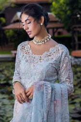 Indulge in elegance with this stunning outfit, featuring hand-embellished embroidery and sequins on the front yoke, back yoke, sleeves, and front panels. The ensemble is completed with a raw silk trousers, and a dupatta adorned with exquisite organza lace and borders, accented by exclusive handmade sleeve tassels and golden samosa lace for a luxurious and refined finish.       Package Details:  Embroidered, sequinned & hand embellished front yoke Embroidered & sequinned back yoke & sleeves Embroidered & seq