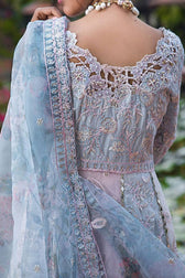 Indulge in elegance with this stunning outfit, featuring hand-embellished embroidery and sequins on the front yoke, back yoke, sleeves, and front panels. The ensemble is completed with a raw silk trousers, and a dupatta adorned with exquisite organza lace and borders, accented by exclusive handmade sleeve tassels and golden samosa lace for a luxurious and refined finish.       Package Details:  Embroidered, sequinned & hand embellished front yoke Embroidered & sequinned back yoke & sleeves Embroidered & seq