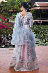 Indulge in elegance with this stunning outfit, featuring hand-embellished embroidery and sequins on the front yoke, back yoke, sleeves, and front panels. The ensemble is completed with a raw silk trousers, and a dupatta adorned with exquisite organza lace and borders, accented by exclusive handmade sleeve tassels and golden samosa lace for a luxurious and refined finish.       Package Details:  Embroidered, sequinned & hand embellished front yoke Embroidered & sequinned back yoke & sleeves Embroidered & seq
