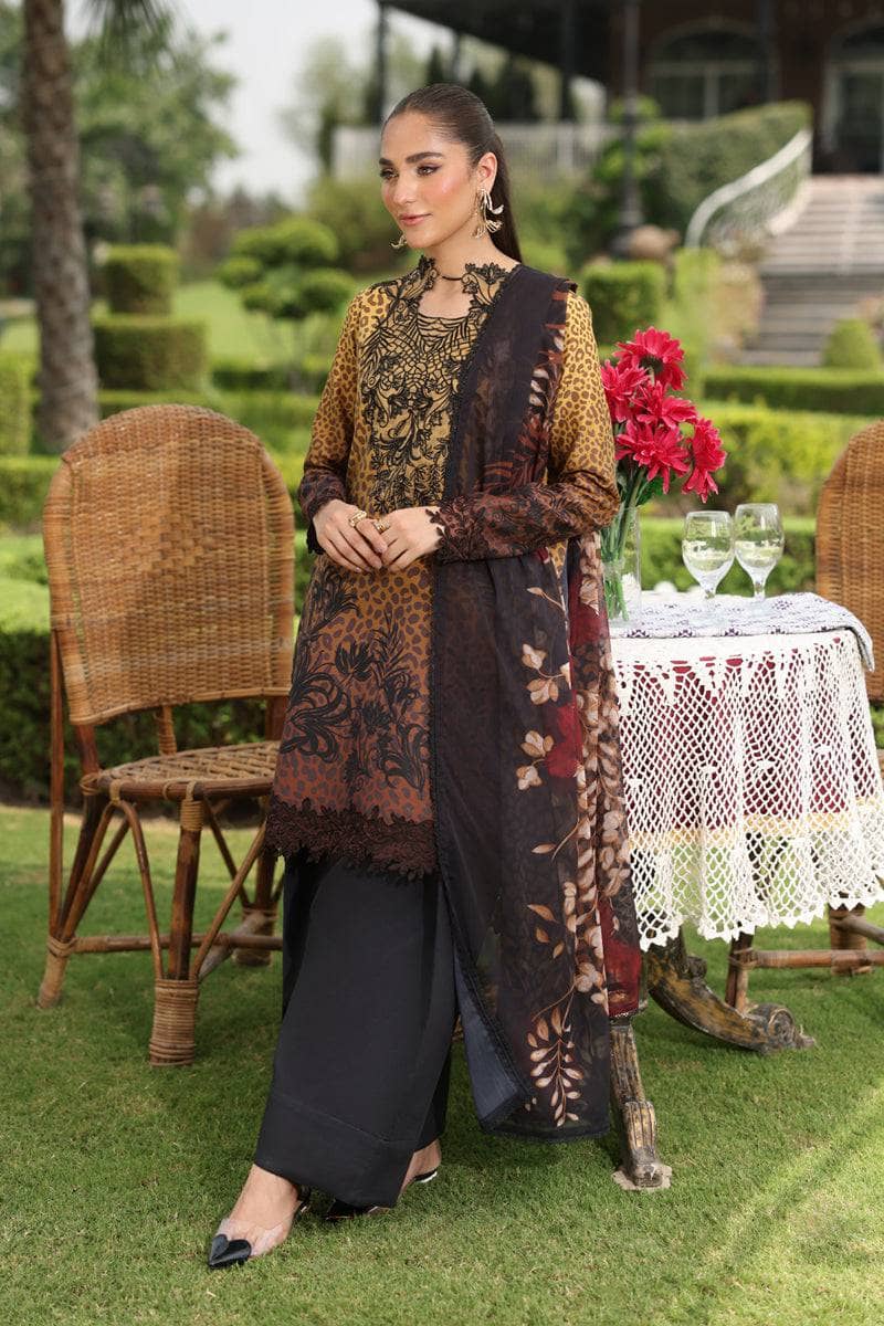 Woman in traditional attire standing outdoors with garden and table in the background