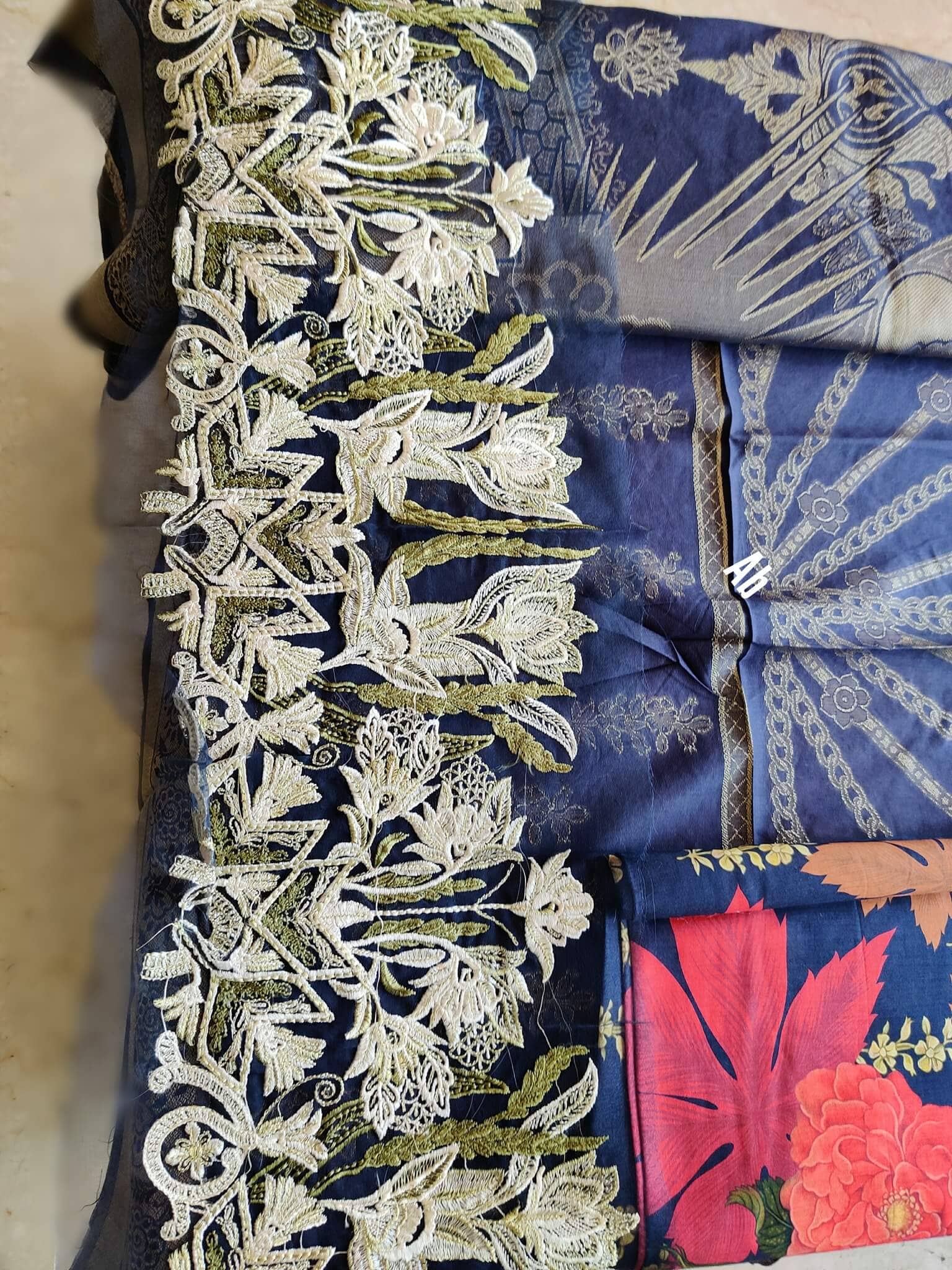 img_open_pic_firdous_lawn_awwal_boutique