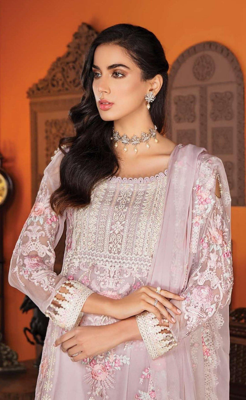 Embroidered Chiffon Shirt with sequins and baadla: 3.25 yards • Embroidered front border patch on tissue: 28 inches • Embroidered back border patch on tissue: 28 inches • Embroidered sleeves border patch on tissue: 40 inches • Embroidered chiffon dupatta with stitched 4 side lace with 3D roses and pearls: 2.5 yards • Dyed PK grip trouser: 2.5 yards • Crystals and pearls for shirt tasseling